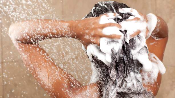 Woman-washing-her-hair-with-shampoo-too-much-shampoo-on-hair